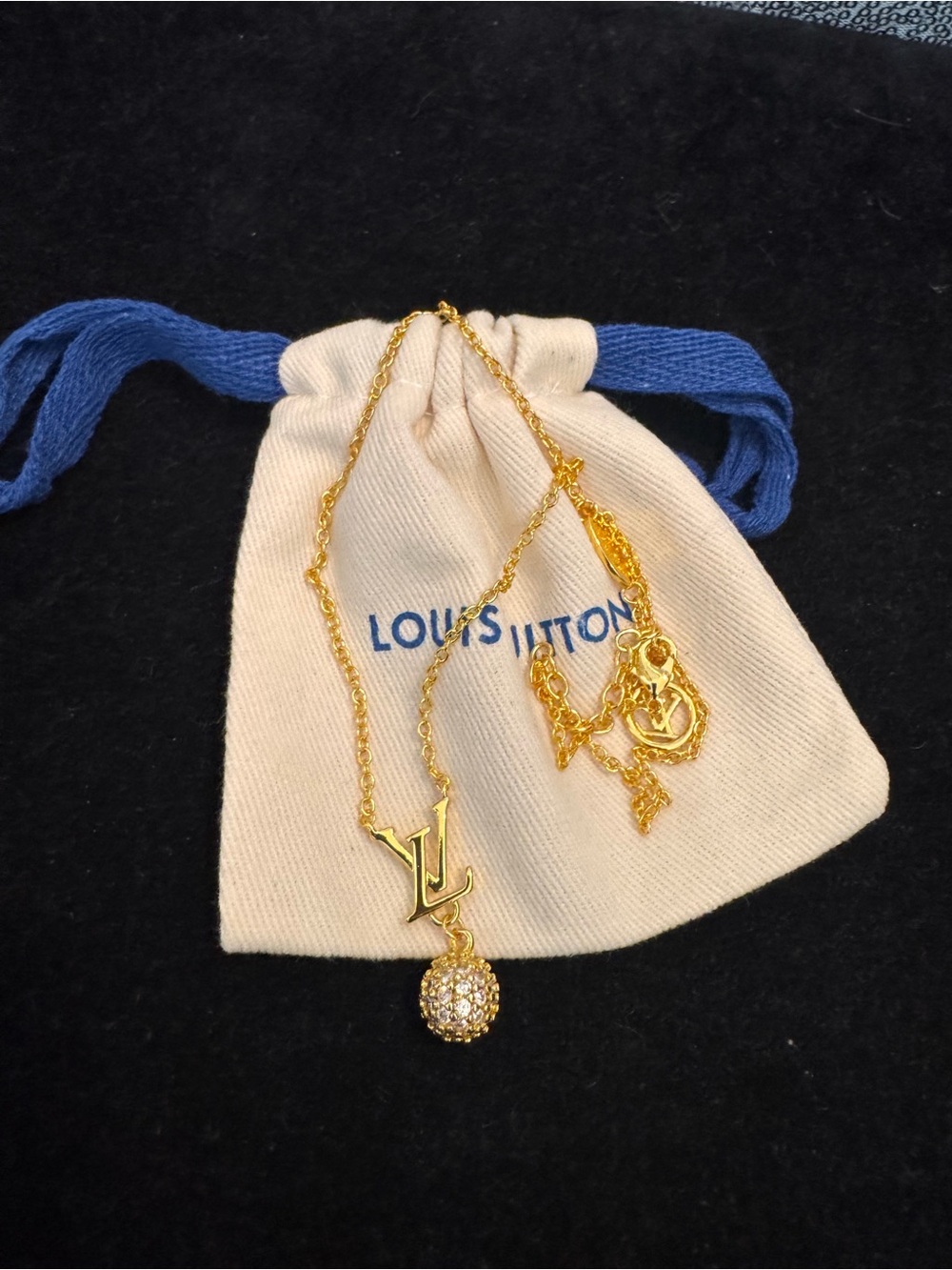 Louis Vuitton Gold and Cream LV Pendant Necklace with Crystal Drop
